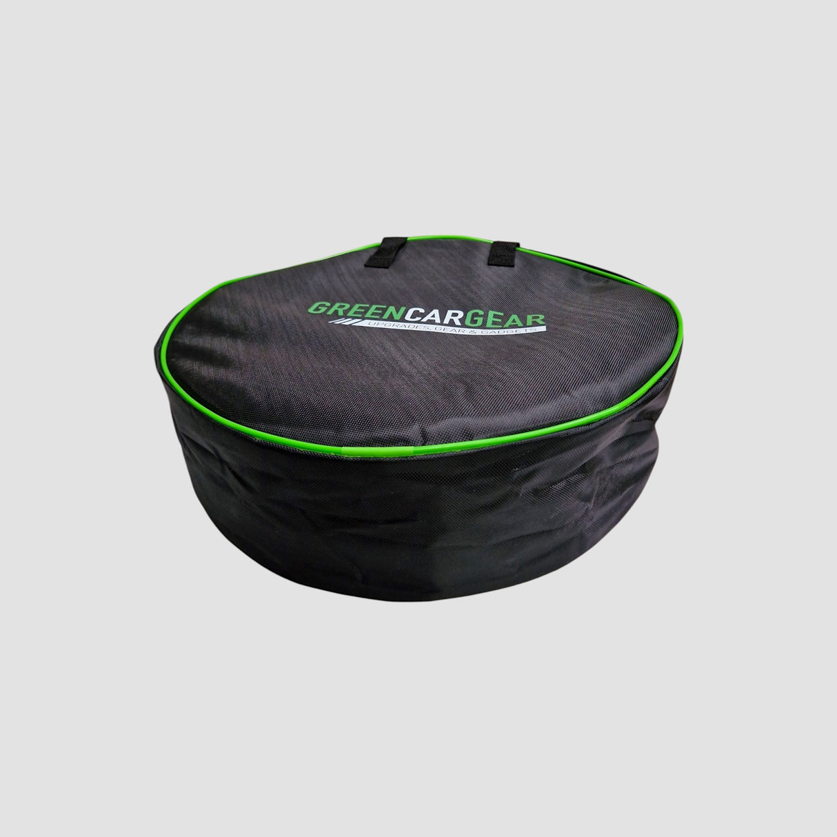 GCG MAX Ladekabel- oder mobile Ladetasche mit Logo und grünem Rand.