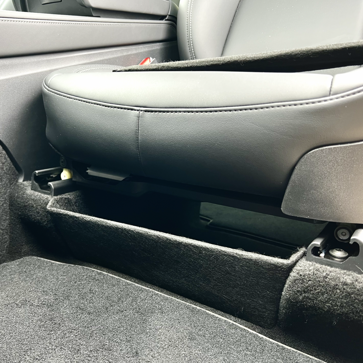 Teile zur Aufbewahrung unter dem Sitz für Tesla Model Y