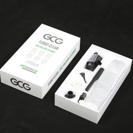 Auto-Staubsauger in offener Box mit Zubehör, einsatzbereit