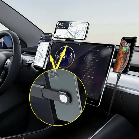 Es sind viele Handyhalter angebracht, die zeigen, wie viele gleichzeitig Platz haben. Alle halten ein Handy.