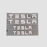 Buchstaben "TESLA"